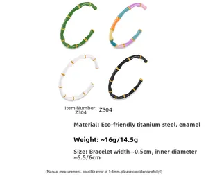 Detail of vintage bamboo-style titanium steel cuffs with colorful enamel drip finish