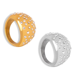 Polished wide geometric rings in gold and silver with sparkling inlaid crystals