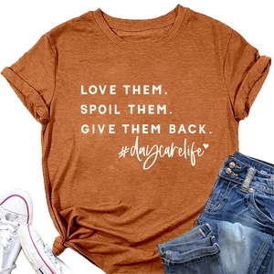 Detail of rust red cotton t-shirt featuring love them spoil them print and cuffed sleeves