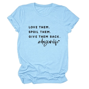 Detail view of light blue crew neck T-shirt with black love them spoil them text