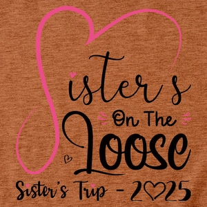 Detail of Sisters On The Loose print and pink heart on caramel cotton T-shirt