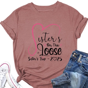 Detail view of Sisters On The Loose 2025 print on a dusty pink casual cotton T-shirt