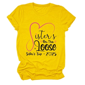 Detail of Sisters On The Loose print on bright yellow crew neck cotton t-shirt