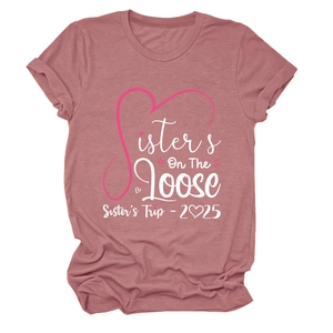 Close-up of Sisters On The Loose print on pink crew neck cotton t-shirt for sister trip