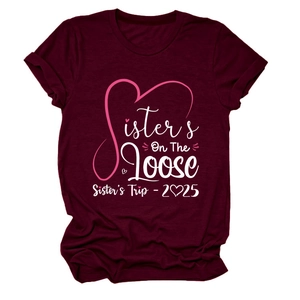 Detail of burgundy t-shirt with Sisters On The Loose print and heart graphics
