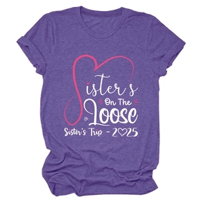 Close-up of the Sisters On The Loose 2025 print on a dark purple knit T-shirt
