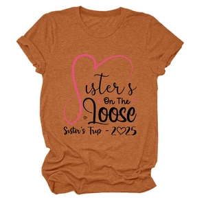 Detail of Sisters On The Loose 2025 print on rust red round neck cotton t-shirt