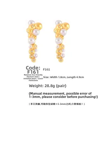 Detail of gold titanium steel earrings with beads, pearls, and crystals showing size dimensions
