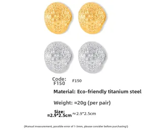 Detail of floral embossed earrings in gold and steel tones with precise dimensions
