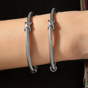 Minimalist silver cable wire twisted open cuff bracelet with X-shaped metal decorative motif