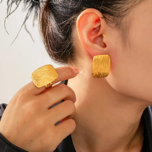 Exaggerated geometric gold plated stainless steel jewelry set with square wave textures