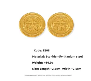 Detailed macro view of vintage round matte gold titanium steel earrings with embossed totem