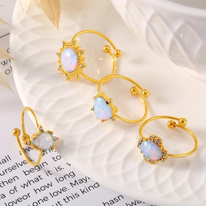 Set of four 18K gold-plated adjustable rings with opal stones and sparkling rhinestones