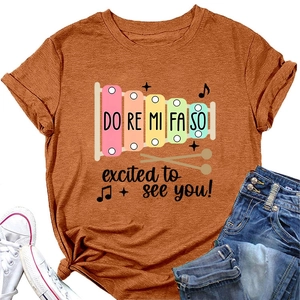 T-shirt orange brûlé avec graphique de xylophone et texte imprimé excited to see you
