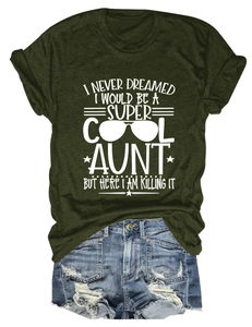 Detail of dark green cotton T-shirt featuring white artistic slogan and sunglasses graphic