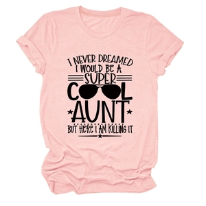 Detail of soft pink cotton t-shirt featuring black Super Cool Aunt text and graphic