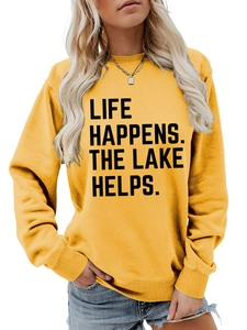 Detail of ribbed cuffs and Life Happens The Lake Helps print on yellow sweatshirt