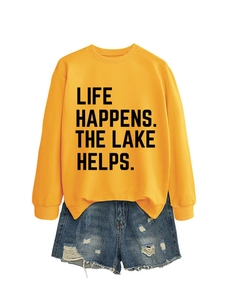 Detail of life happens at the lake print on yellow crewneck sweatshirt with denim shorts
