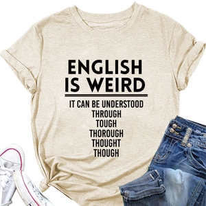 Detail of light beige cotton T-shirt featuring 'English is weird' slogan with tied hem