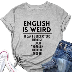 Detail of English Is Weird printed text on grey cotton crew neck short sleeve T-shirt