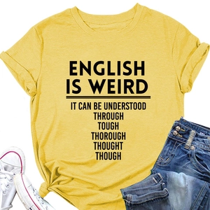 Flat lay of yellow cotton T-shirt with humorous English text, jeans and sneakers