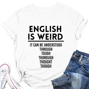 Flat lay of white cotton t-shirt with text print, blue denim shorts and canvas shoes