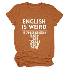 Close-up of English Is Weird slogan print on caramel orange cotton t-shirt