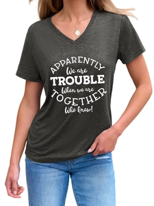 Detail of V-neck short sleeve T-shirt in heather grey with white circular text print
