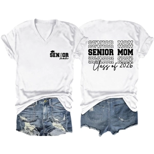 Flat lay of a white V-neck Senior Mom 2026 T-shirt with distressed denim shorts
