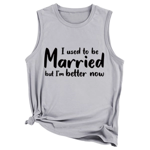 Detail of grey sleeveless tank top with slogan print and stylish front hem knot