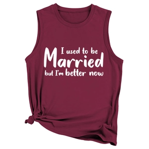 Detail of burgundy tank top with I used to be married but I am better now text print