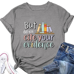 Flat lay of gray t-shirt with 'But did you cite your evidence' text and book illustration