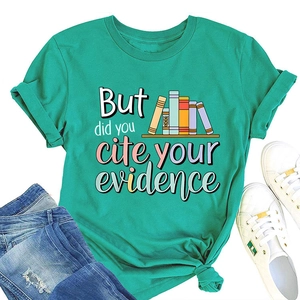 Flat lay of teal crew neck t-shirt with book illustration and cite your evidence text