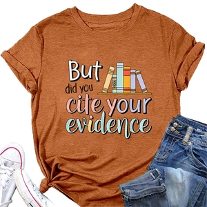 Detail of caramel t-shirt featuring 'But did you cite your' text and book illustration