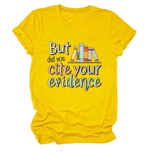 Detailed close-up of the graphic print and cotton texture on a bright yellow T-shirt