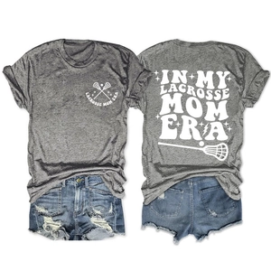 Front and back view of In My Lacrosse Mom Era t-shirt with distressed denim shorts