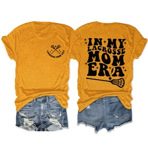 Front and back detail of In My Lacrosse Mom Era orange t-shirt and denim shorts set
