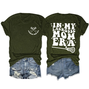 Detail of olive green Lacrosse Mom t-shirt and distressed blue denim shorts set