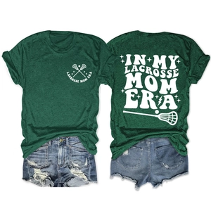 Detailed flat lay of Lacrosse Mom Era t-shirt back with graphic and denim shorts