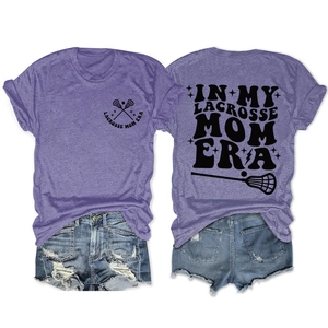 Flat lay detail of purple Lacrosse Mom T-shirt and distressed denim shorts outfit set