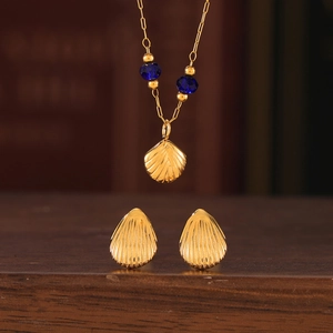 Set collana e orecchini in titanio placcato oro 18k con perle di cristallo viola