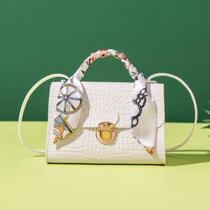 Elegant white crocodile embossed crossbody bag with printed silk scarf handle