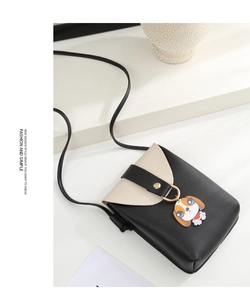 Minimalist crossbody phone bag with contrast flap and cute cartoon dog pendant detail