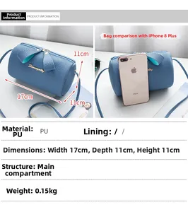 Detailed size view of blue litchi pattern mini cylinder bag measuring 17x11x11cm