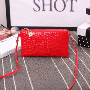Glossy bright red crocodile pattern small crossbody bag with gold hardware detail