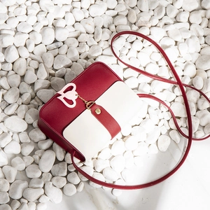 Crossbody small bag in red and white leather with a cute heart pendant and long strap