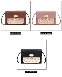 Vue détaillée de sacs bandoulière bicolores avec motifs ajourés et boucles métalliques