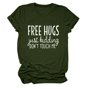 Close-up of fabric texture and slogan print on dark green short sleeve cotton t-shirt