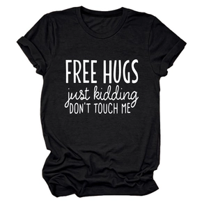 Detail view of cotton t-shirt with Free Hugs Just Kidding print and folded sleeves