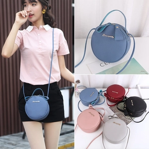 Women's circular litchi leather crossbody bags in five colors with top handles